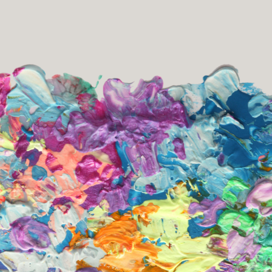 empty gray fading into colorful pastel paint splotches